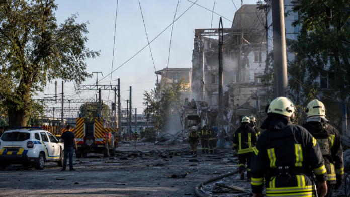 Emergency crews working after overnight missile and drone strikes in the Kyiv region of Ukraine