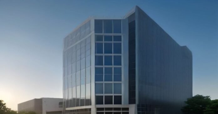 Modern glass corporate office building representing a technology hub