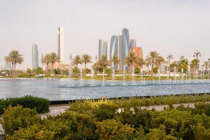 Downtown Abu Dhabi skyline seen from the gardens of Qasr Al Watan, the UAE presidential palace