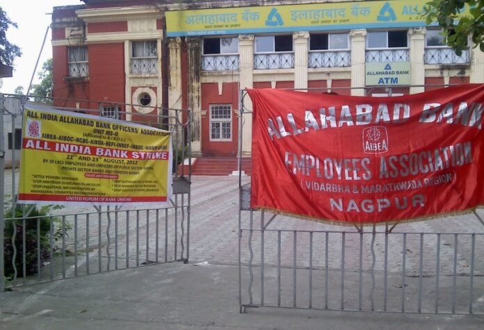 Bank employees’ union banners outside a bank branch during a strike