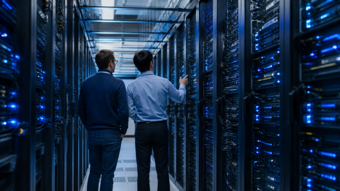 Dell AI server demand represented by engineers in a modern data centre