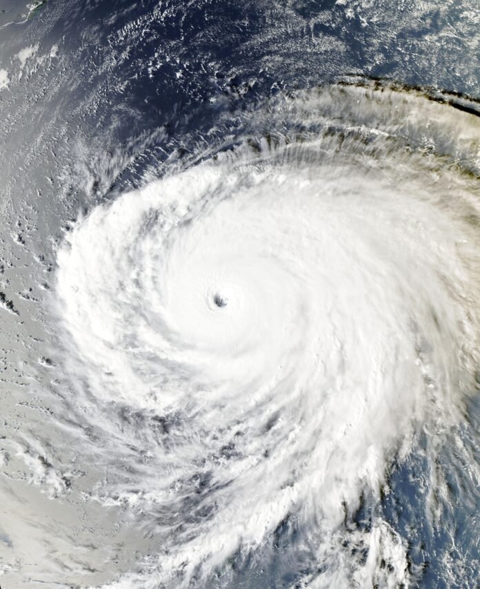 Satellite view of Typhoon Champi on October 20, 2026 at 06:36 UTC. Credit: MODIS / Aqua, NASA EOSDIS Worldview / Wikimedia Commons, public domain. Not a live October 22 satellite image.