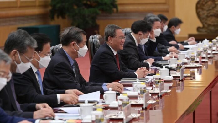 Mikhail Mishustin and Li Qiang during their May 2023 talks