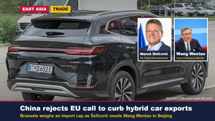 BYD Seal U DM-i plug-in hybrid car with insets of EU Trade Commissioner Maroš Šefčovič and Chinese Commerce Minister Wang Wentao