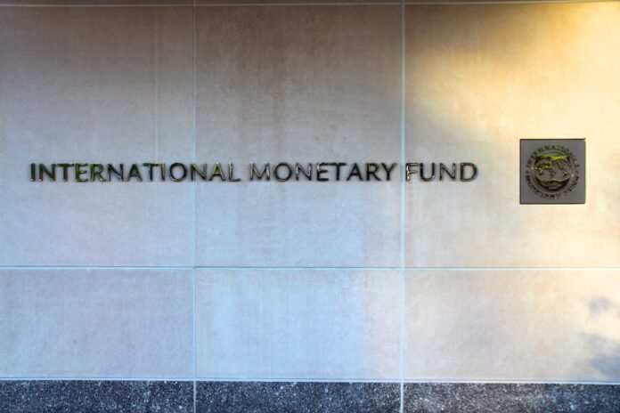 File photograph of the International Monetary Fund headquarters sign in Washington