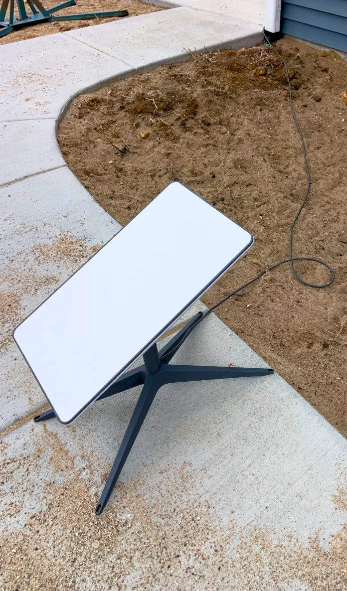 File photograph of a rectangular Starlink satellite internet terminal outdoors File photograph of a rectangular Starlink satellite internet terminal outdoors