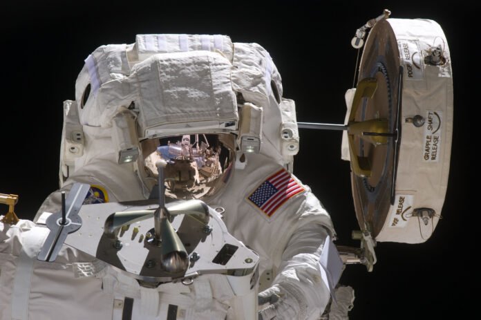 NASA file photograph of astronaut Michael Fincke working outside the International Space Station during STS-134