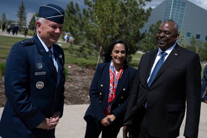 Anita Anand with Glen VanHerck and Lloyd Austin at Peterson Space Force Base in June 2022, a file photo
