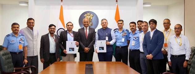 Officials with contract documents at the defence agreement signing in New Delhi on October 15, 2026