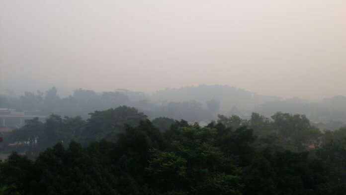 Haze over Singapore near Rifle Range Road in June 2013 — file photo Haze over Singapore near Rifle Range Road in June 2013