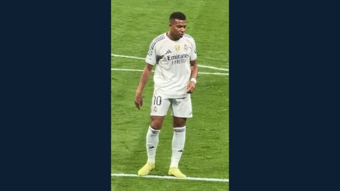 Kylian Mbappé in a Real Madrid shirt in an archived match photograph
