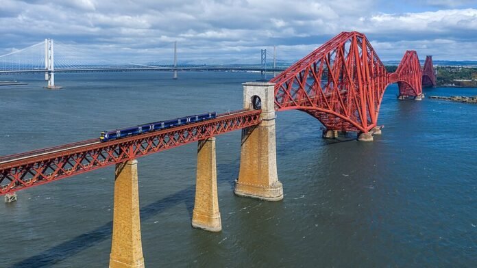 ScotRail train crossing Scotland’s Forth Bridge in an archived photograph